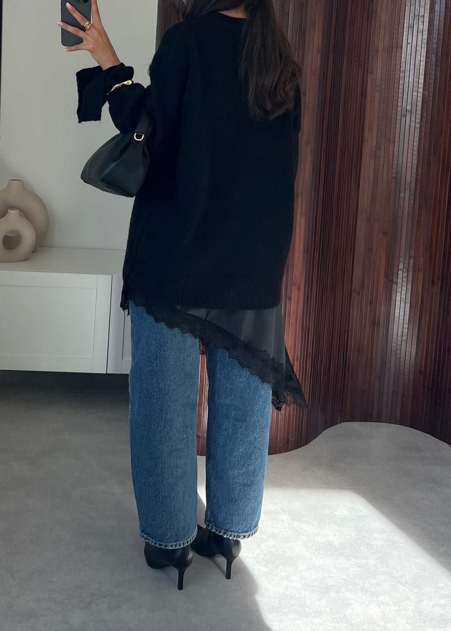 PULL NOIR MANCHE FENDUE